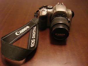 $300, Canon Model DS6041 EOS Rebel 6.3 MP Digital Camera with 55mm lens. Original price was $750. Condition is good.